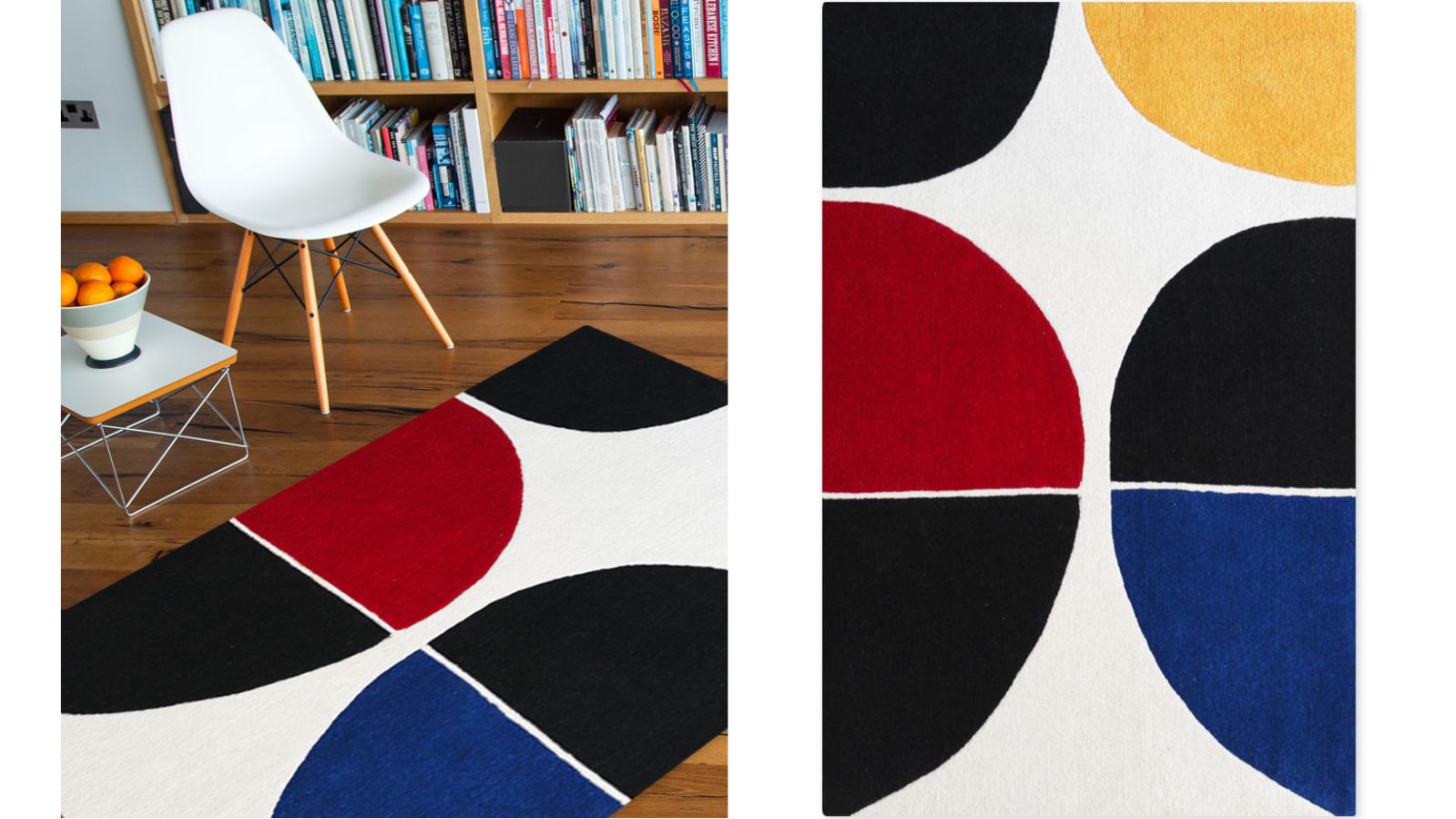 A rectangular floor rug bauhaus style with a bold geometric pattern of red, blue, yellow, and black semi-circles on a white background.